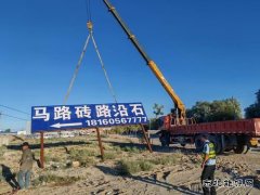 北屯执法大队联合住建部门 共同治理城镇化路段广告设施